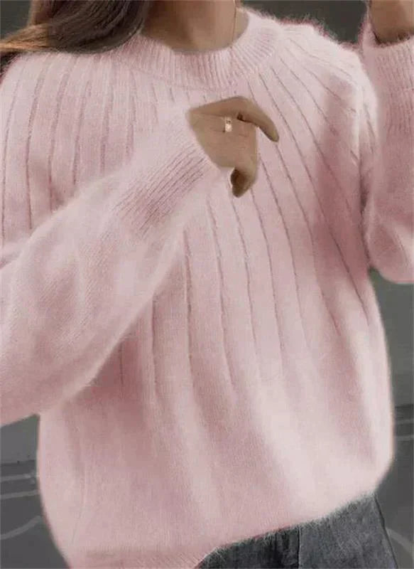 Soft knit pullover sweater for women with a relaxed fit, a must-have for winter fashion.