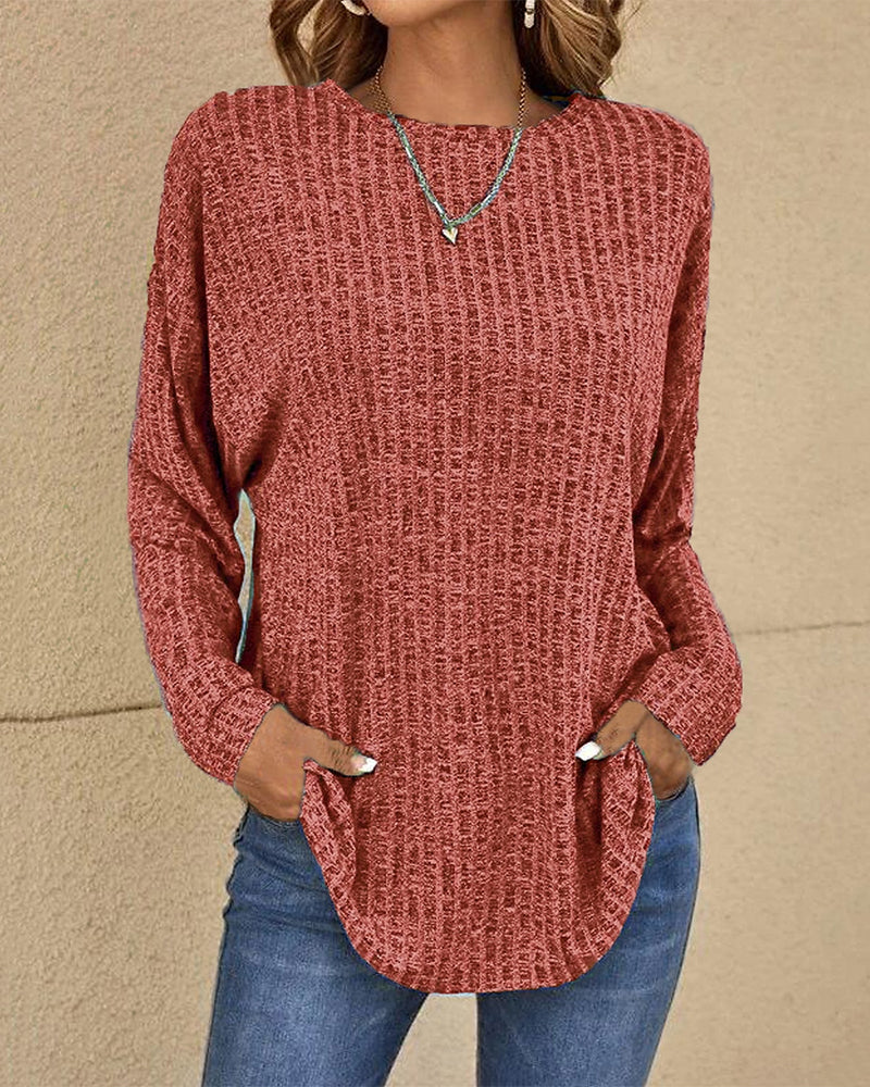 Basic women's crew neck long sleeve top in a cozy knit, essential for easy everyday wear & layering.