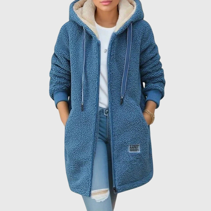 Women's cozy fleece zip-up jacket in grey, perfect for casual winter fashion and comfort.