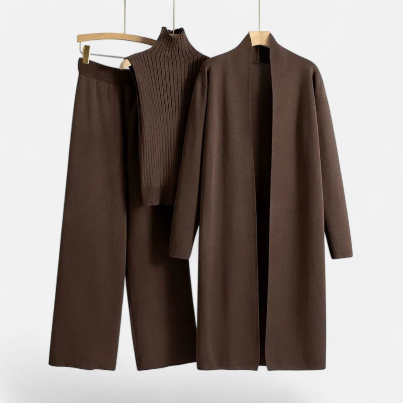 Modern women's knitwear ensemble: vest, buttonless cardigan & trendy wide-leg trousers. Autumn/winter style.