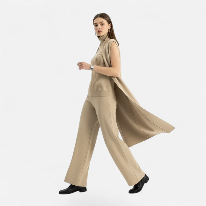 Women's luxurious knit three-piece: soft vest, long-line cardigan & stylish wide-leg trousers. Autumn fashion.