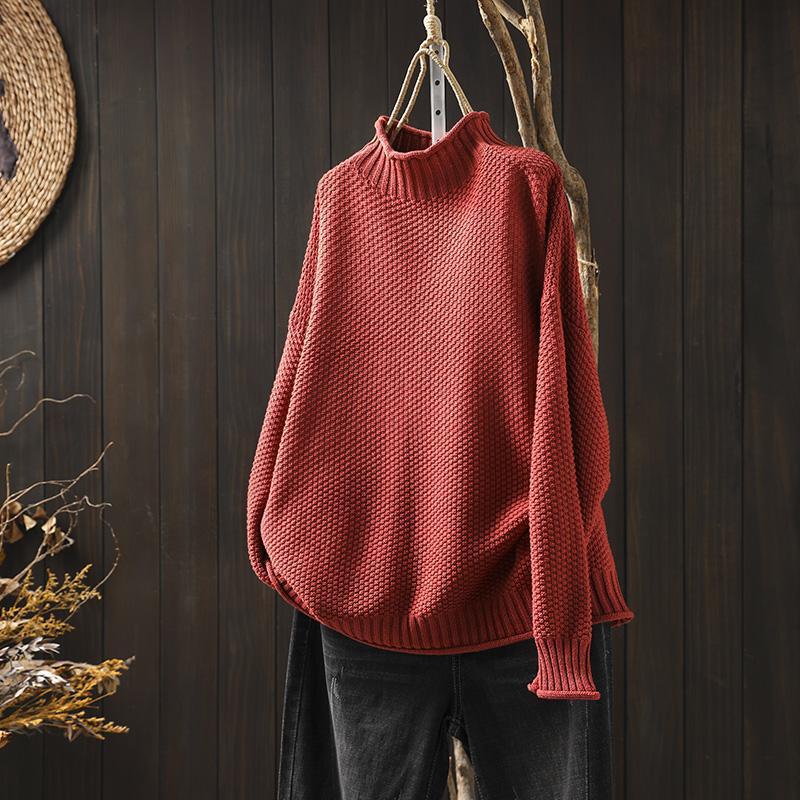 Creamy white women's knit round neck sweater, long sleeve, perfect for everyday casual wear.