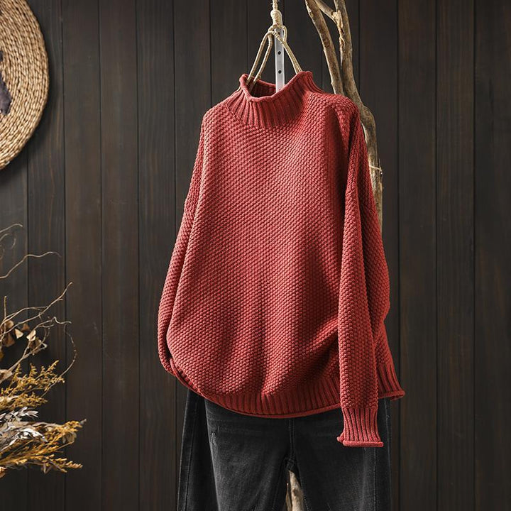 Creamy white women's knit round neck sweater, long sleeve, perfect for everyday casual wear.