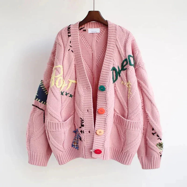 New women's knitwear cardigan featuring a V-neck and stylish patchwork embroidery, ideal for winter.
