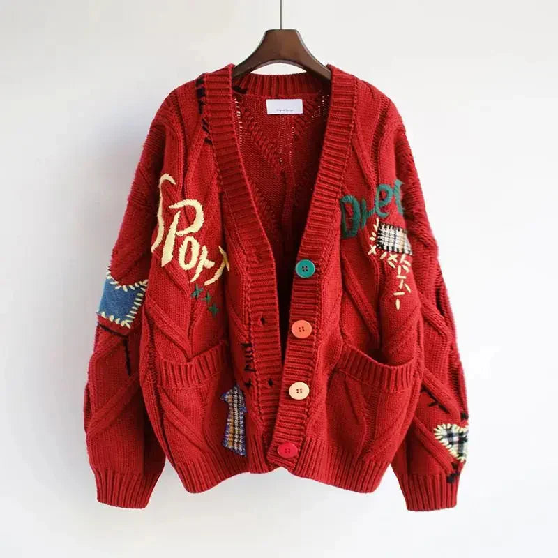 Autumn women's cardigan, soft knit with V-neckline and unique patchwork embroidery design.