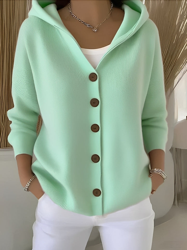Soft knitted women's hooded cardigan, button-front, perfect for cozy autumn and winter style.