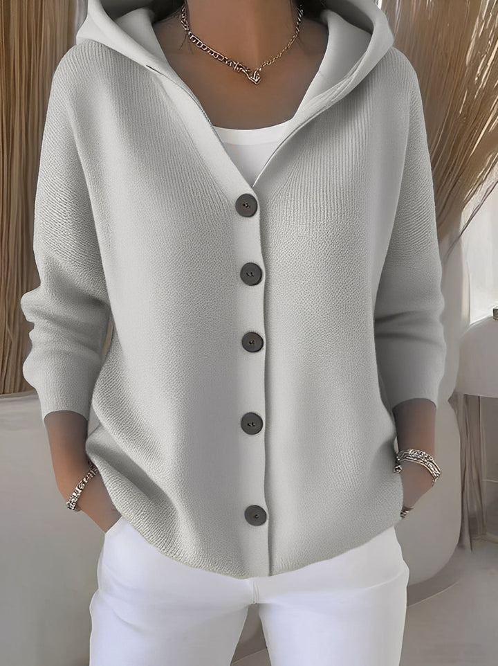Comfortable women's hooded cardigan with front buttons, a cozy essential for effortless casual fashion.