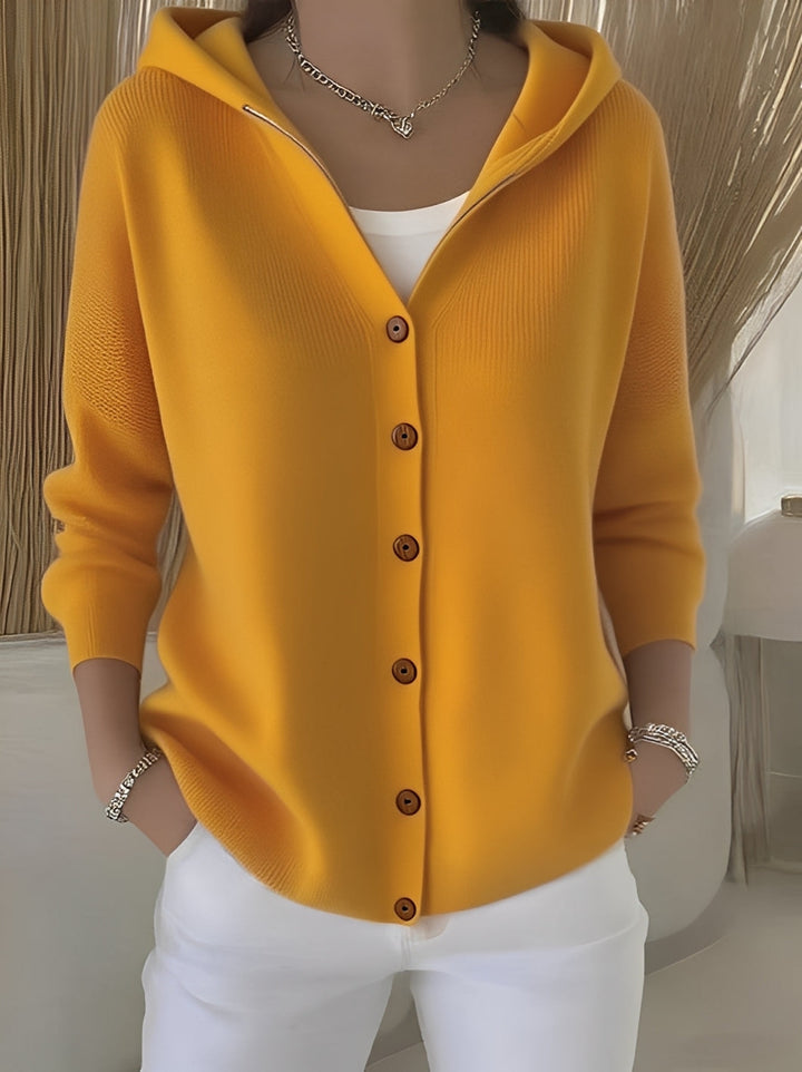 Stylish women's knitted hooded cardigan, button-up, perfect outerwear for cozy autumn and winter days.