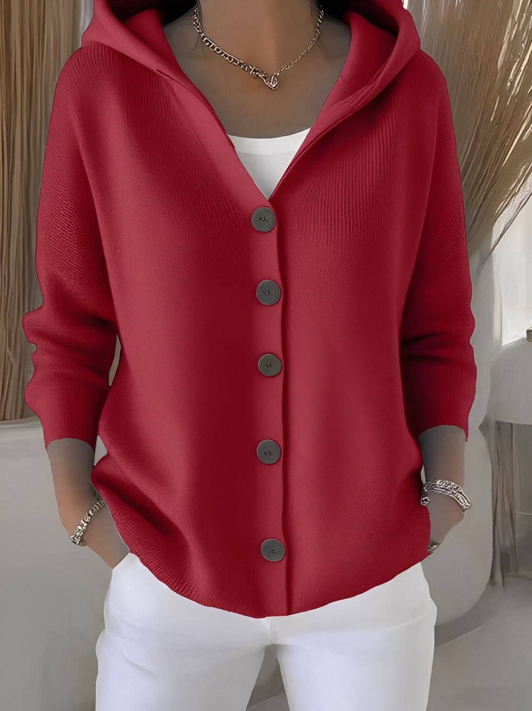 Women's casual hooded cardigan, buttoned, easily layers over outfits for a chic and cozy look.