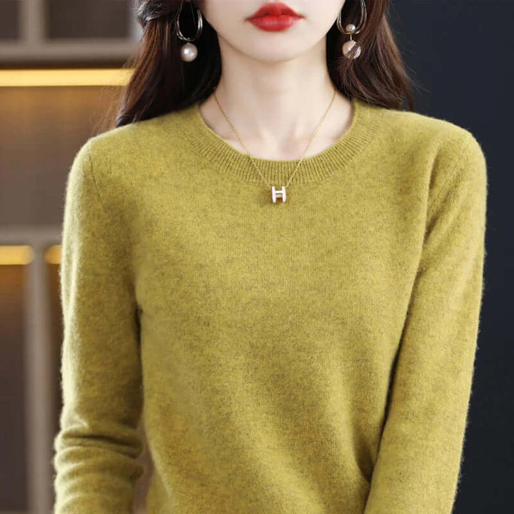 Women's cozy knitted sweater, soft & elegant for fall/winter comfort.
