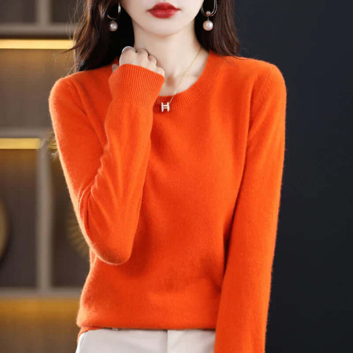Round-neck women's knitted top, offering casual elegance & warm comfort for fall.