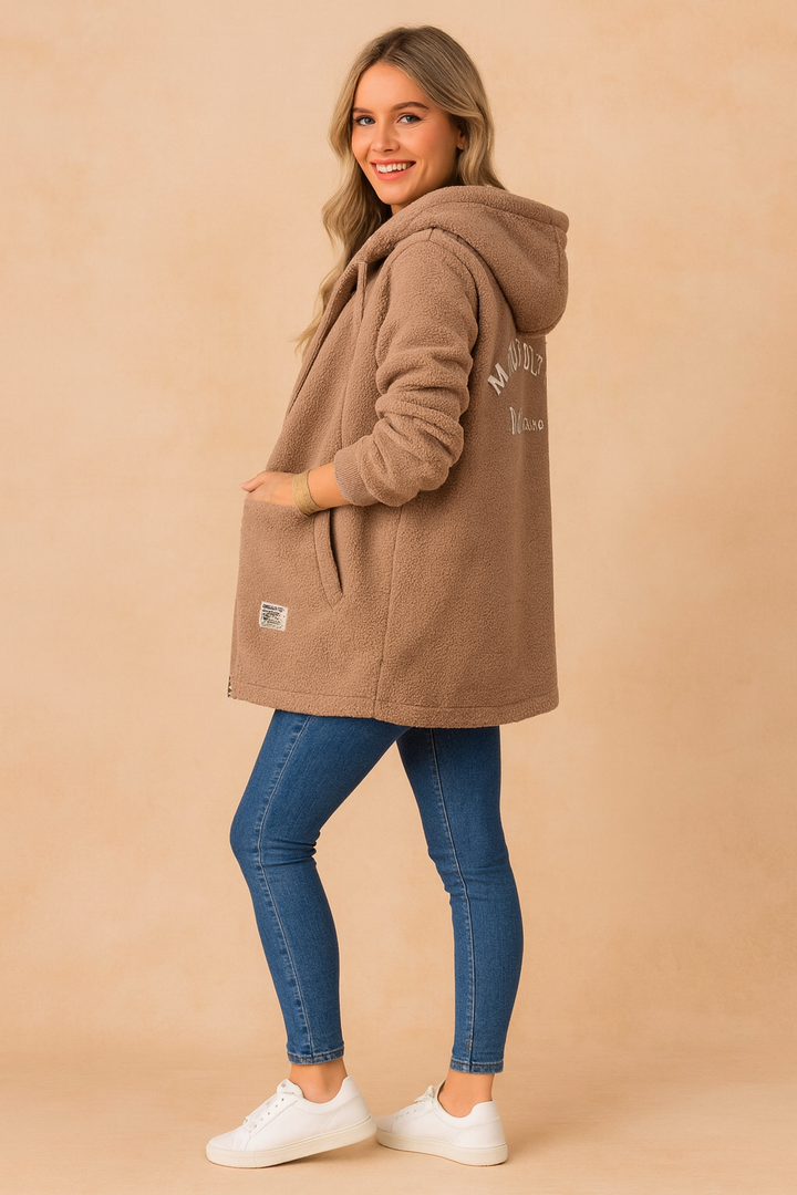 Cozy long hooded winter jacket for women, providing ultimate warmth and comfort as stylish outerwear.