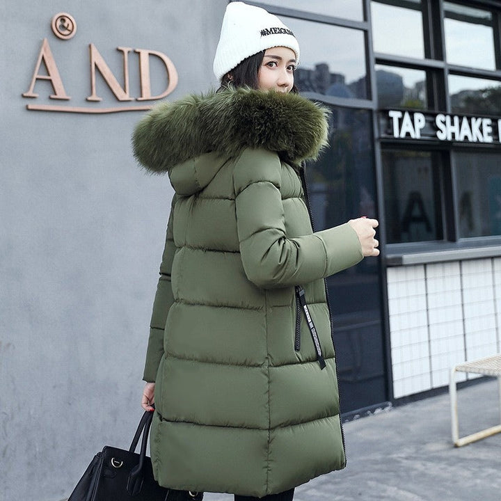 Women's cozy long winter parka with a warm hood, perfect for ultimate cold weather comfort & everyday wear.