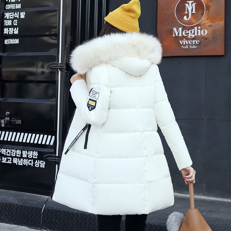 Cozy women's long hooded winter parka, a stylish & warm cold weather coat for everyday wear and travel.