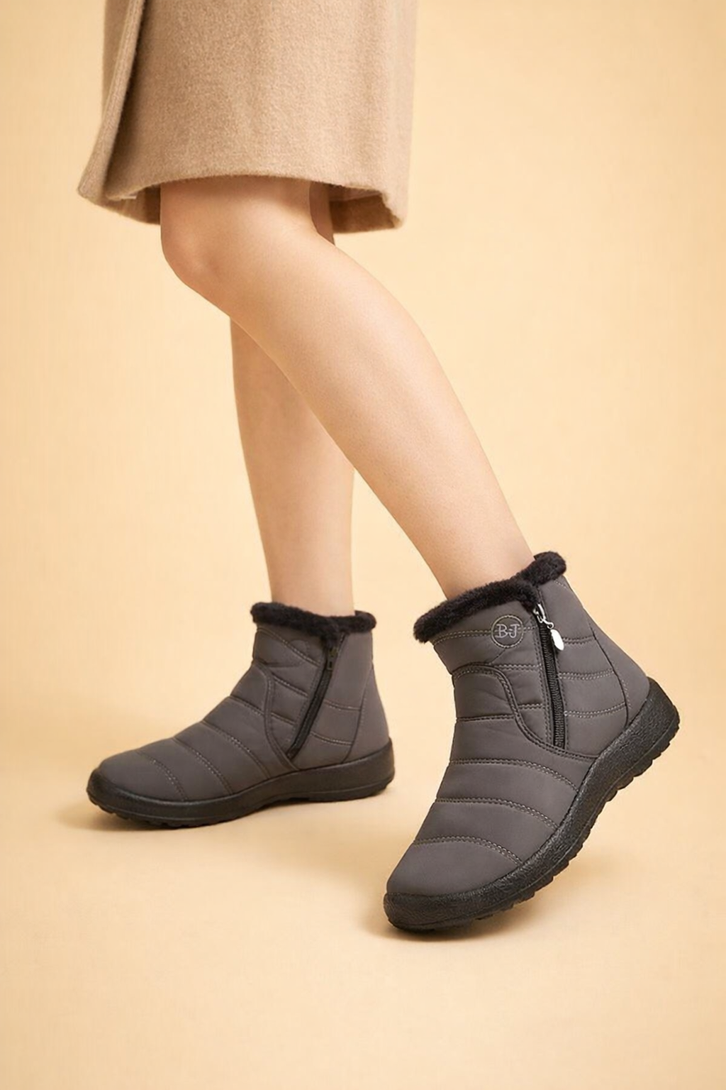 Waterproof women's winter boots with warm lining and durable non-slip sole for snow & ice.