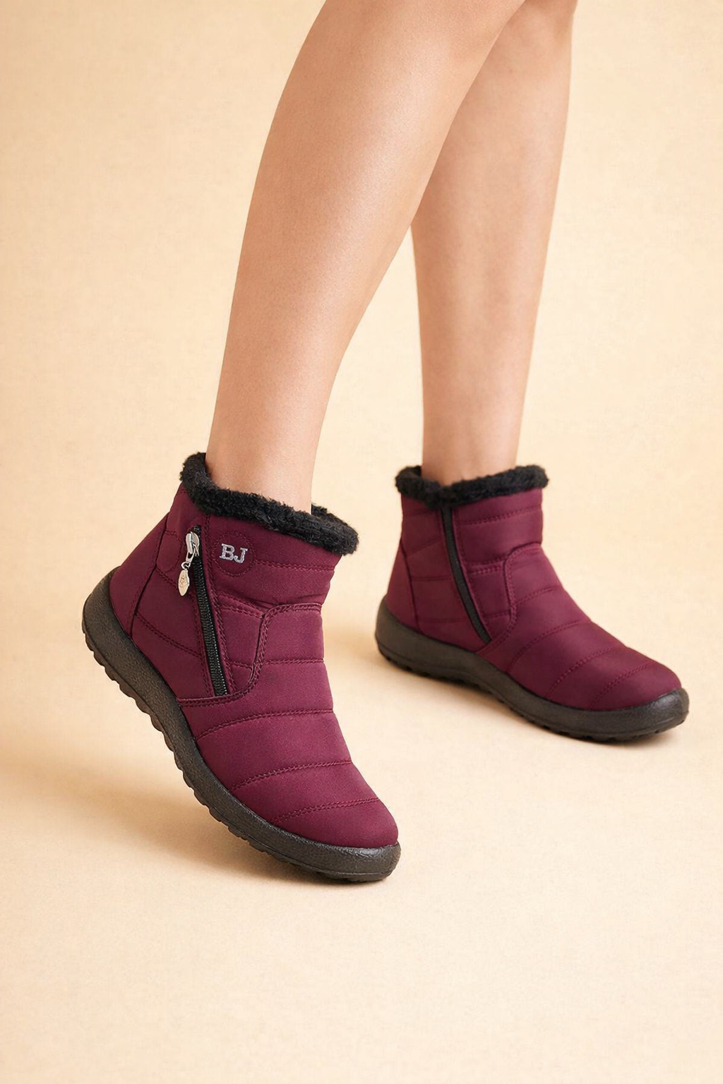 Durable women's cold weather boots, non-slip sole provides secure footing on icy surfaces.