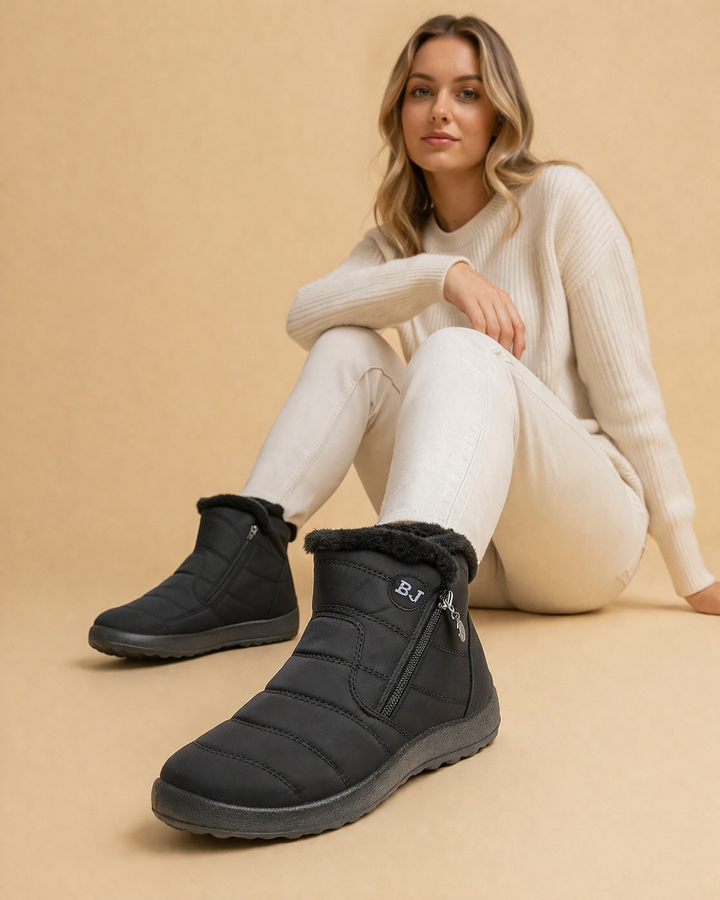 Fashionable women's winter snow boots, offering ultimate warmth, comfort, and non-slip safety.