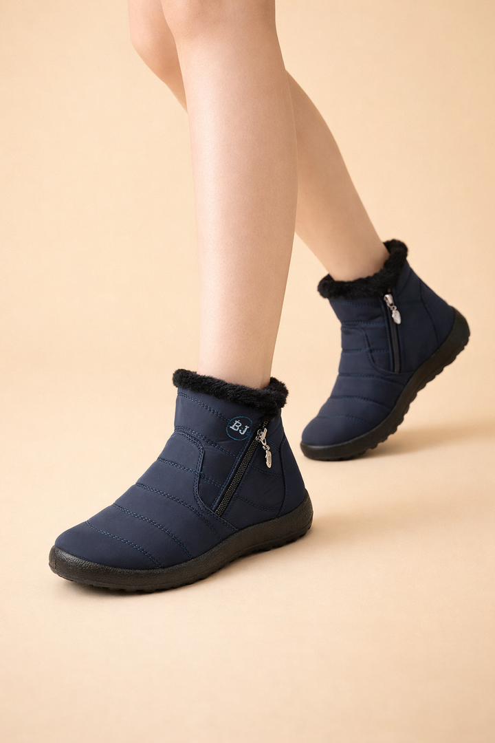 Comfortable women's snow boots with soft lining, non-slip grip, and durable winter protection.