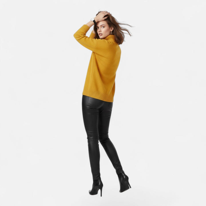 Elegant knit oversized turtleneck sweater, a cozy choice for women's autumn style.