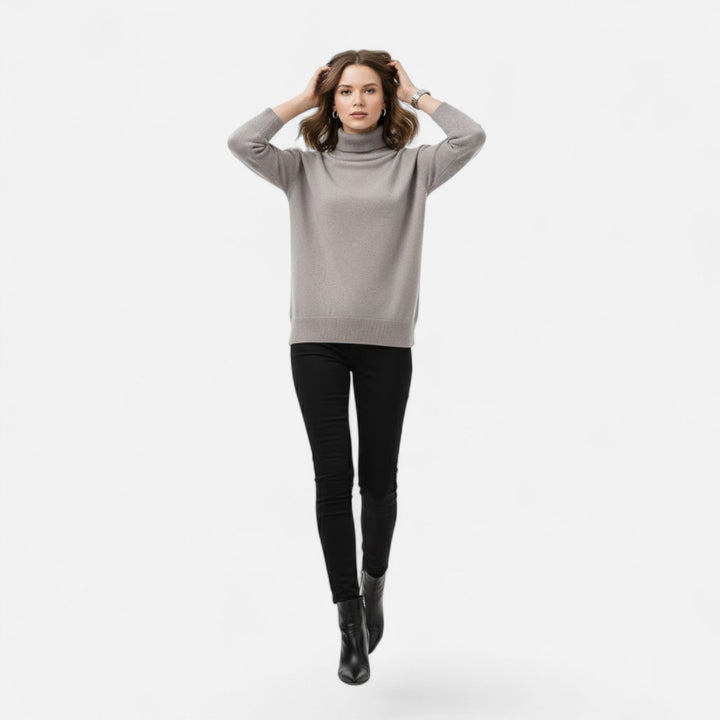 Elegant oversized turtleneck sweater for women, soft and warm for winter.