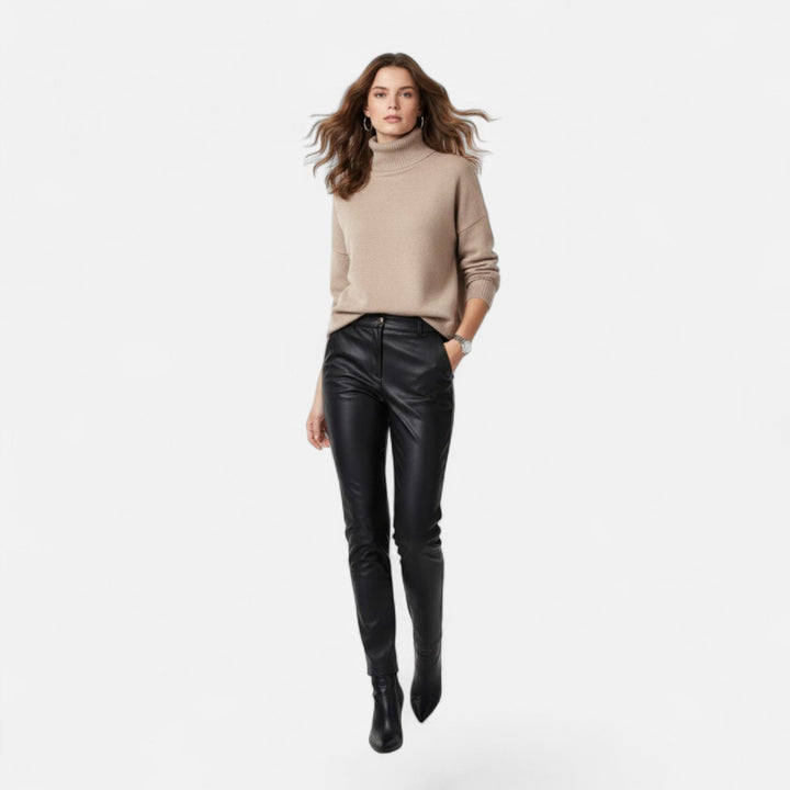 Warm long sleeve women's turtleneck sweater, a cozy essential for cold weather.