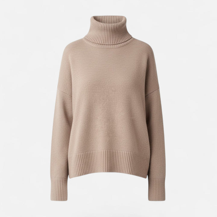Chunky knit women's turtleneck, offering a relaxed fit & cozy autumn style.