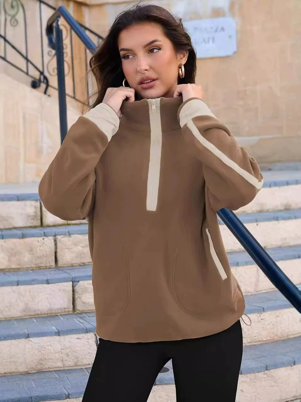 Women's cozy quarter-zip pullover sweater, perfect for casual layering in fall & winter.