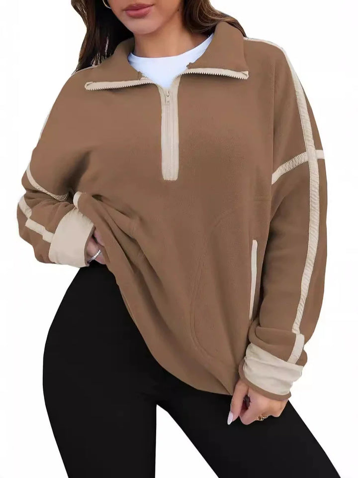 Plush women's quarter-zip sweater, a versatile piece for fall fashion and winter layering.