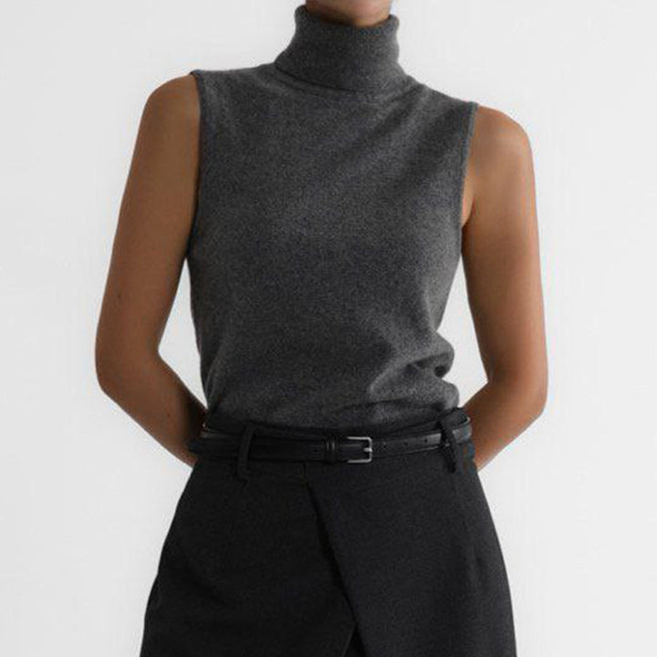 Warm women's long sleeve turtleneck sweater, a cozy knit top for ultimate winter comfort.