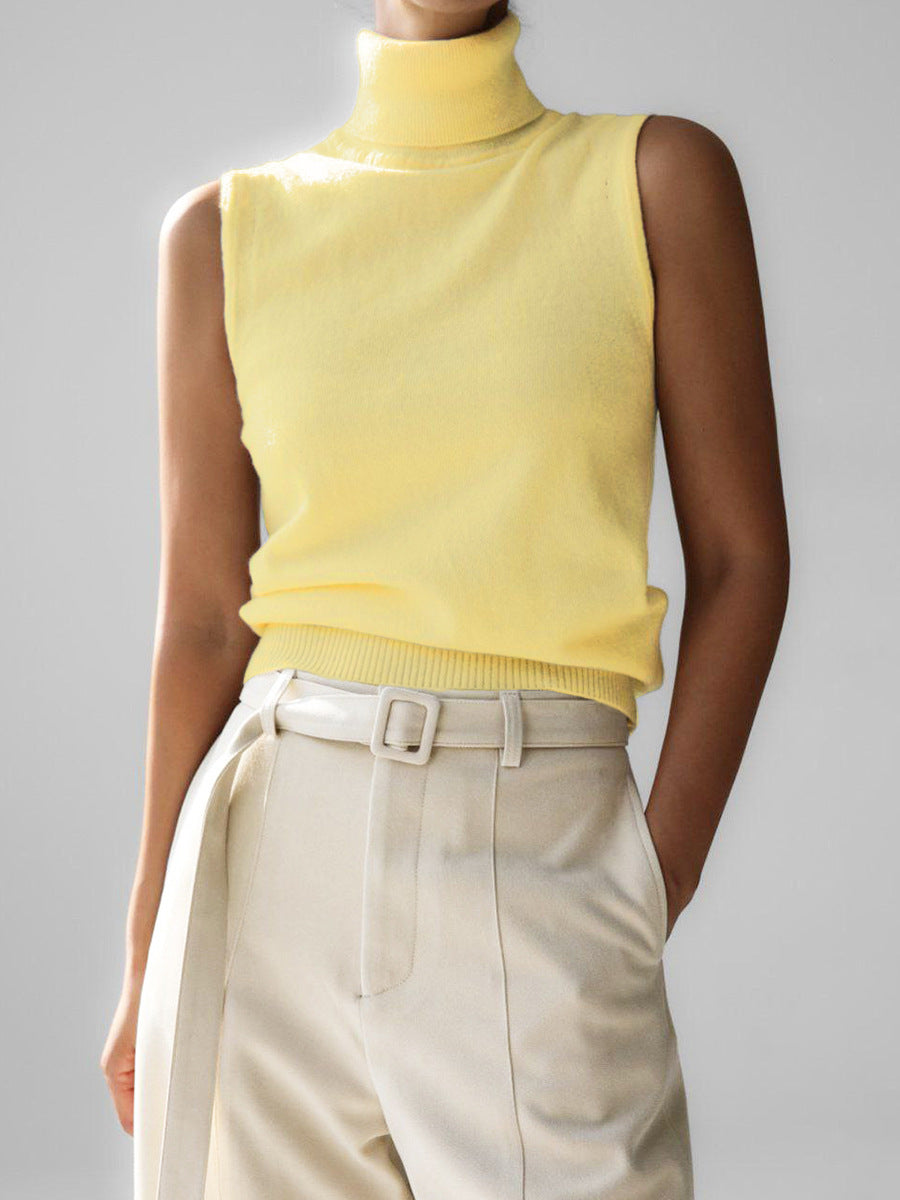 Women's warm turtleneck knit sweater, an essential long sleeve top for winter comfort and style.