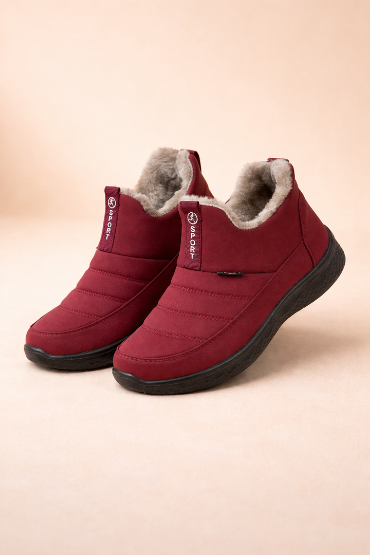 Women's cozy waterproof winter ankle boots with side zipper, perfect for cold weather & fall fashion.