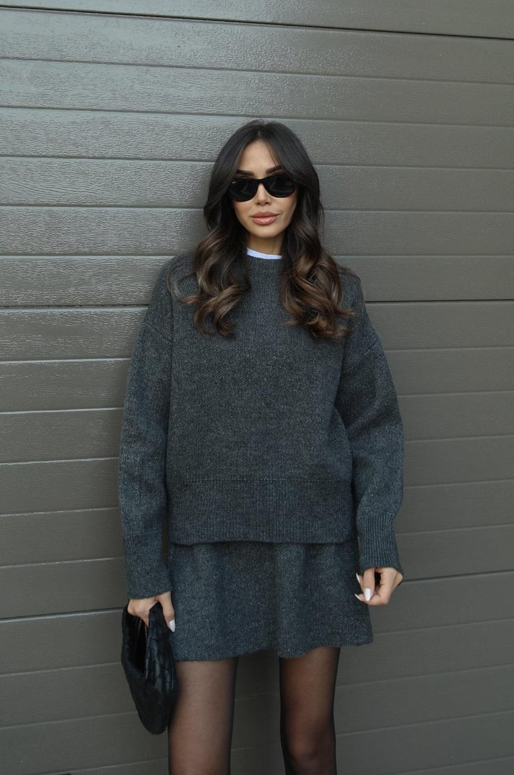 Stylish women's co-ord set in a soft knit fabric, sweater top and mini skirt combo