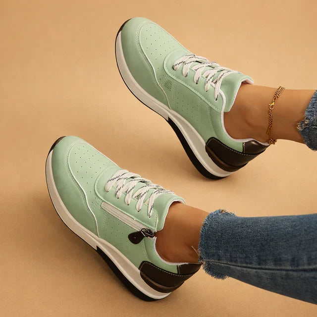 Comfortable women's low-top sneakers with advanced cushioning for all-day support and everyday activities.