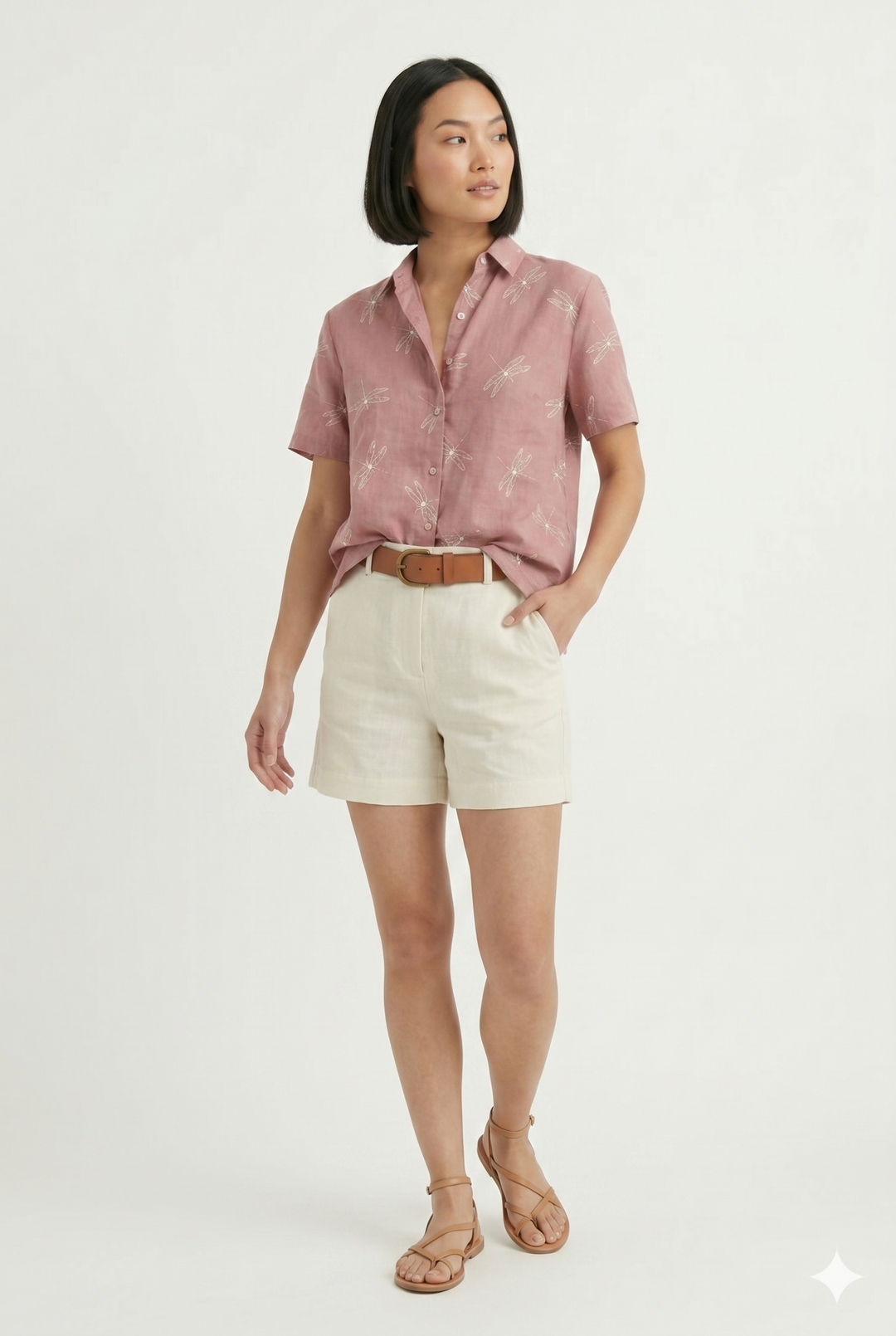 Women's dark pink printed button-up shirt. Lightweight summer blouse with short sleeves, relaxed fit for casual wear.