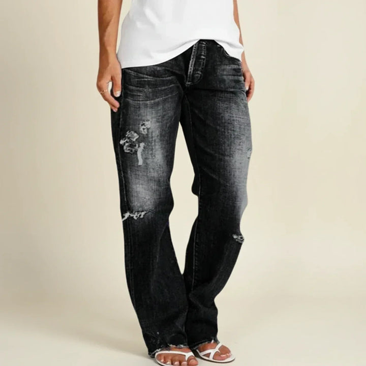 Stylish plus size women's ripped jeans with a high-rise waist and straight leg fit.