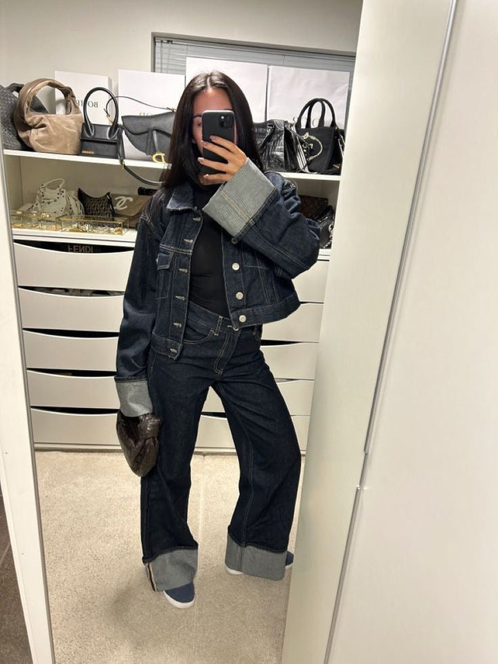 Spring fashion ensemble: denim blue cropped jacket and trousers, a must-have women's casual set.