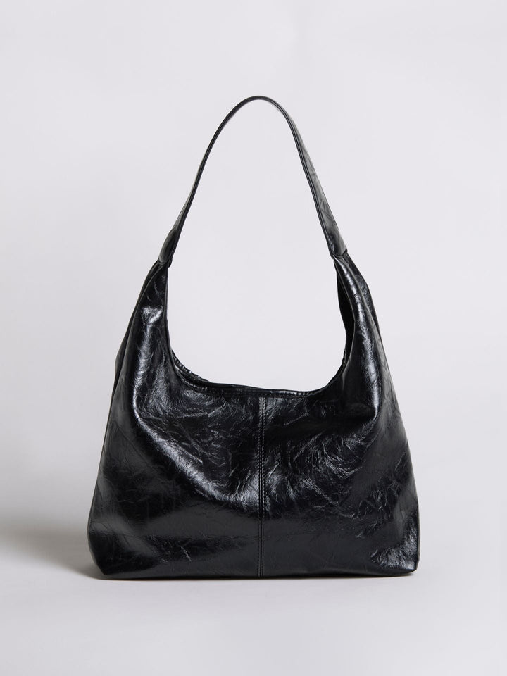 Women's distressed leather tote bag, minimalist style for everyday use