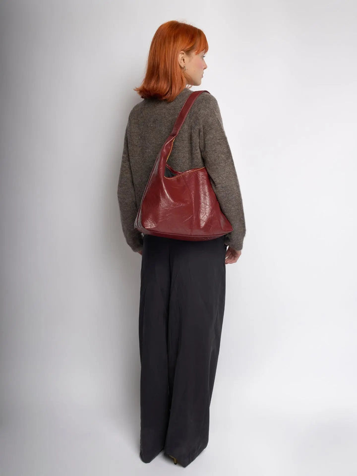 Versatile distressed leather tote bag, suitable for various women's outfits