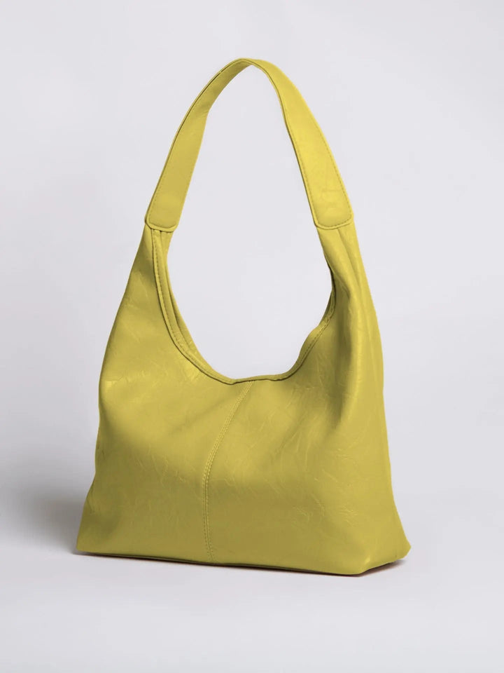 Modern distressed leather tote, a contemporary women's everyday bag