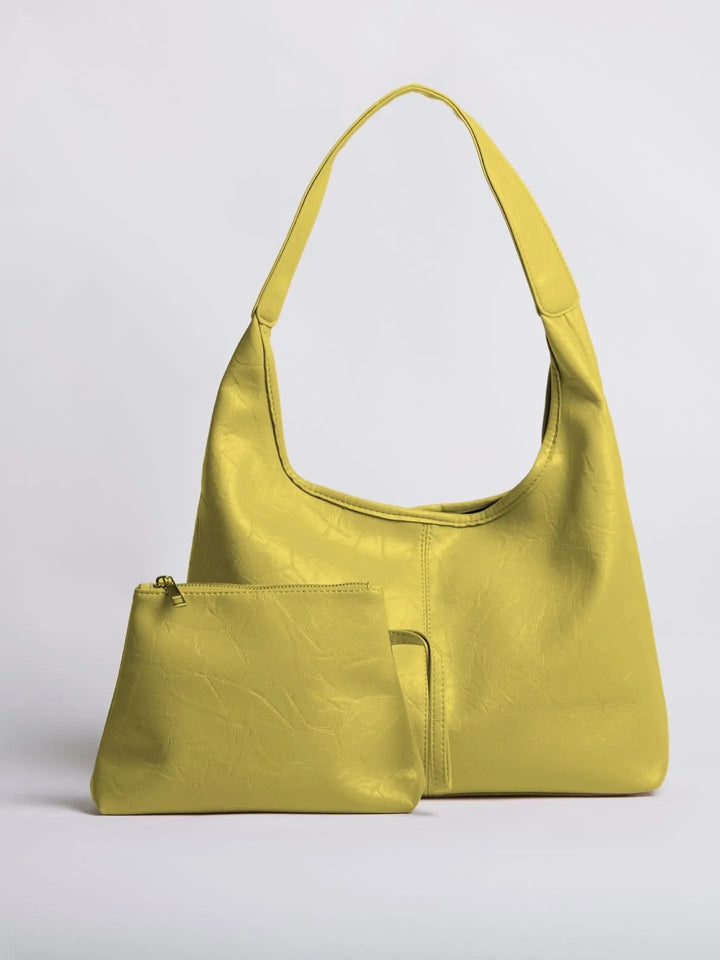 Handcrafted distressed leather tote, a unique women's fashion statement