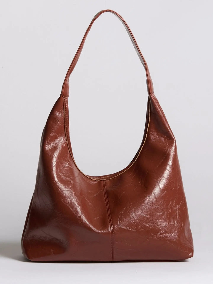 Distressed leather tote for all seasons, a versatile women's everyday bag
