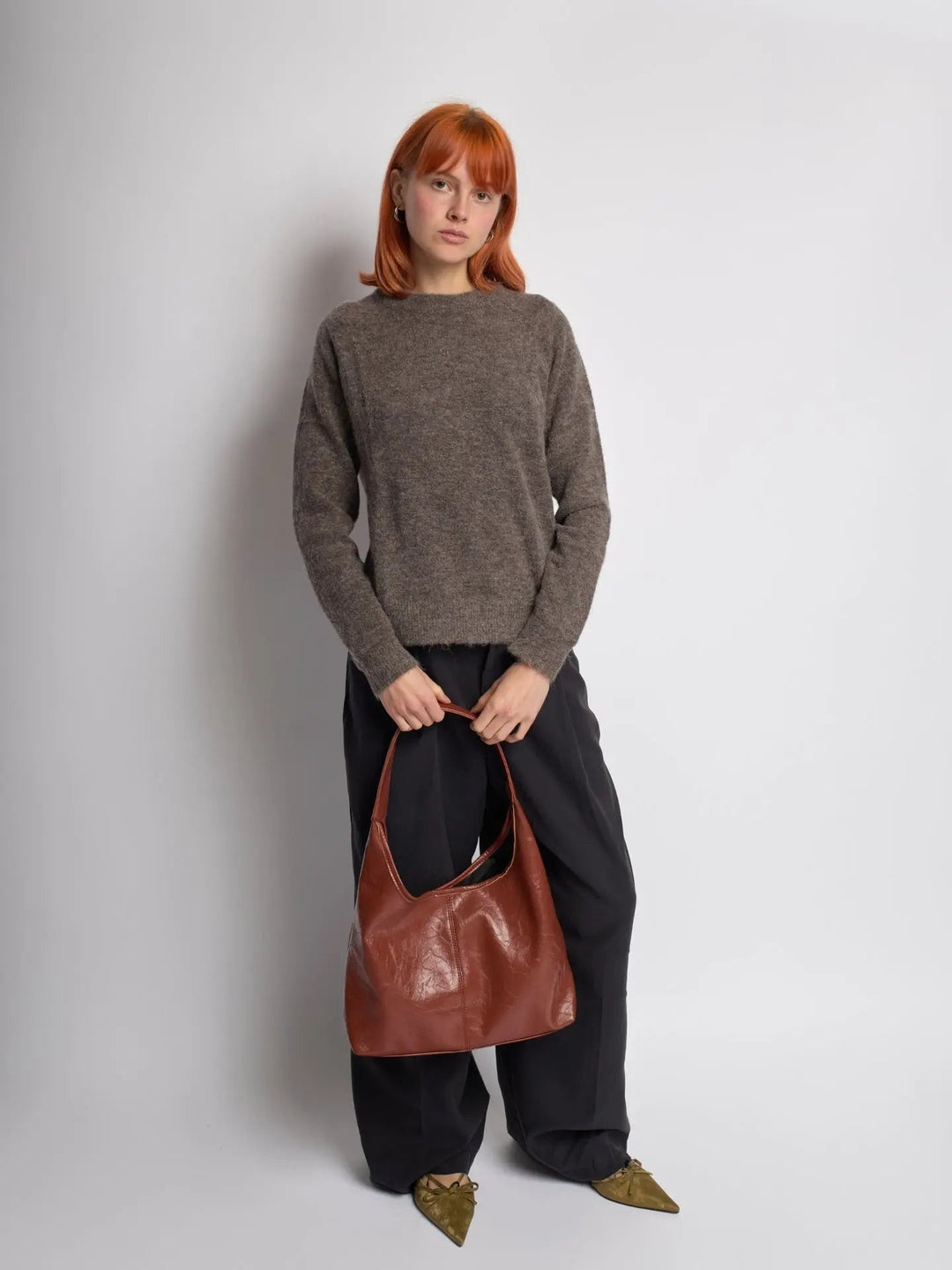 Elegant distressed leather tote, a sophisticated women's shoulder bag