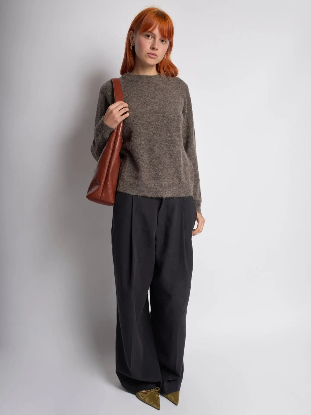 Robust distressed leather tote, a durable women's handbag for daily wear