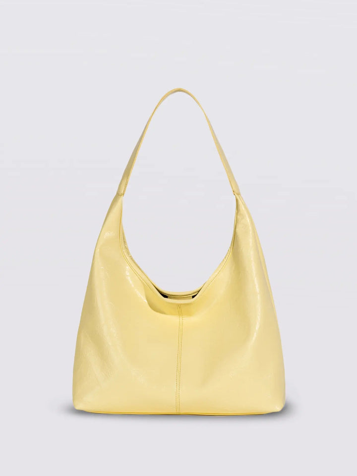 Distressed leather tote with inner pockets, an organized women's bag
