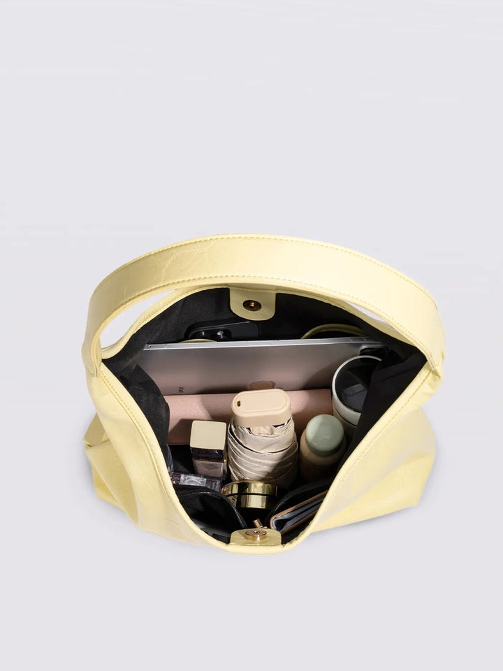 Distressed leather tote for urban ladies, a trendy everyday handbag