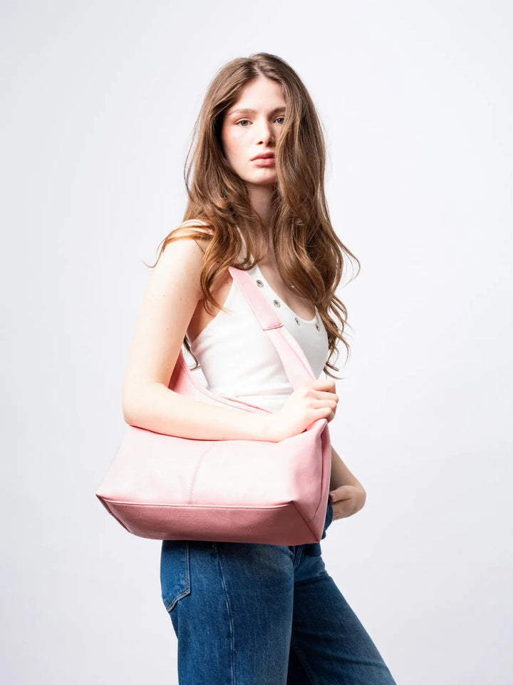 Distressed leather tote for travel, a practical women's carry-on handbag