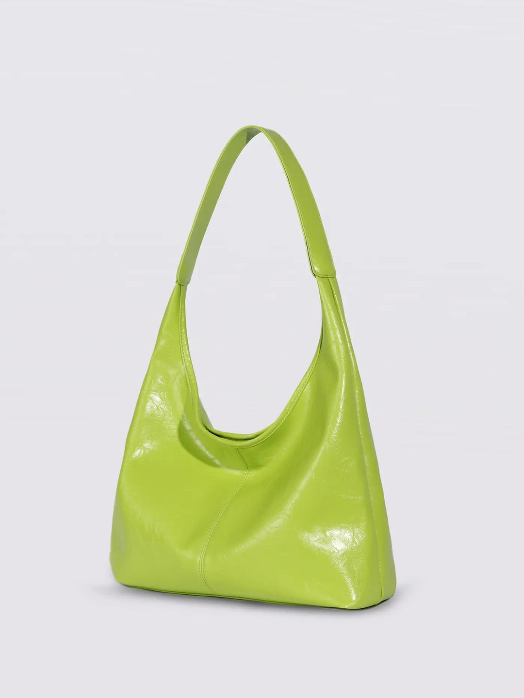 Side view of distressed leather tote, showing depth and silhouette