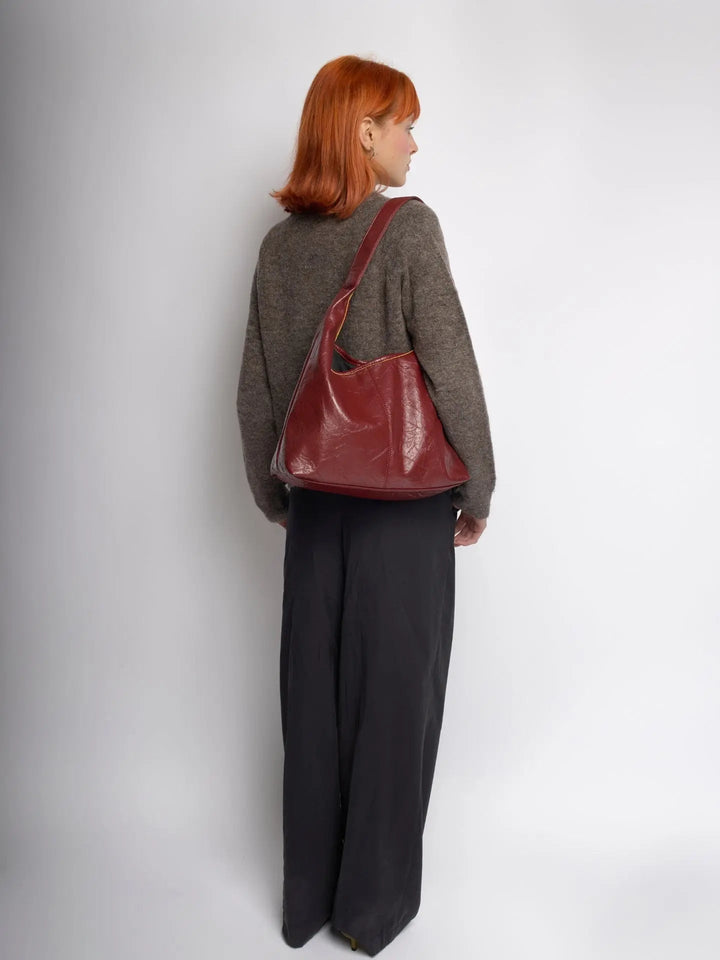 Distressed leather tote for student life, a stylish and durable women's bag