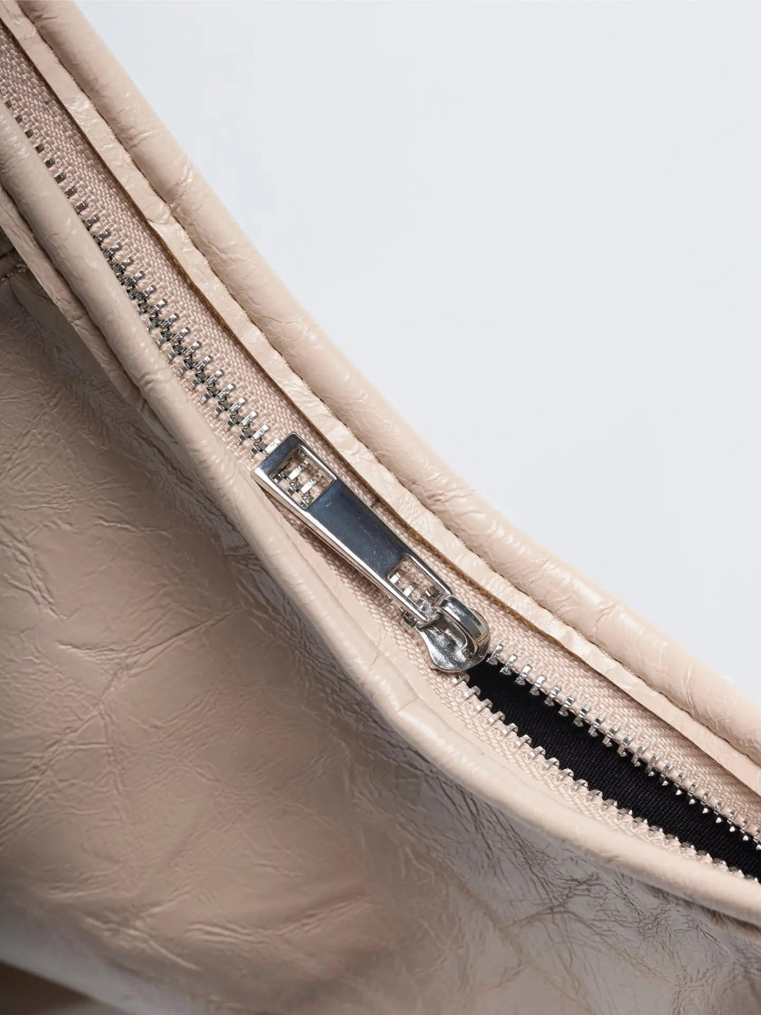 Artisan-made distressed leather tote, showcasing unique women's craftsmanship