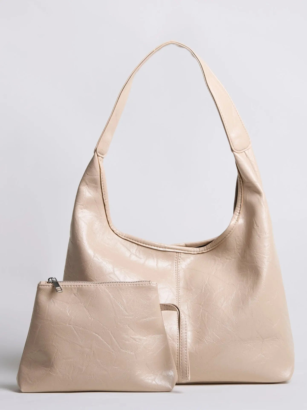 Distressed leather tote with a magnetic closure, for easy access storage